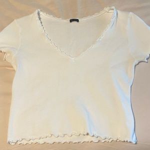 Brandy Melville basics ruffled white top